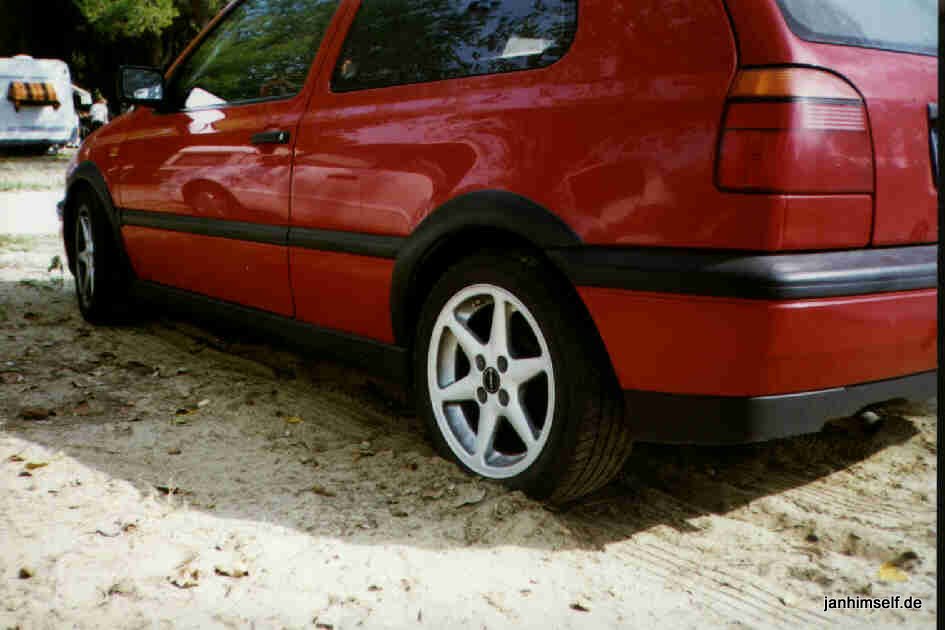 Mein Golf III mit Darstellung des Platten Reifens